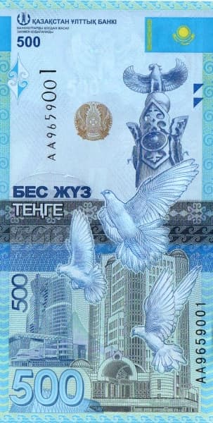 Памятник, карта Казахстана и городская архитектура.