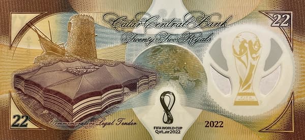 Традиционный катарский кофейник (далла) и кубок FIFA World Cup 2022